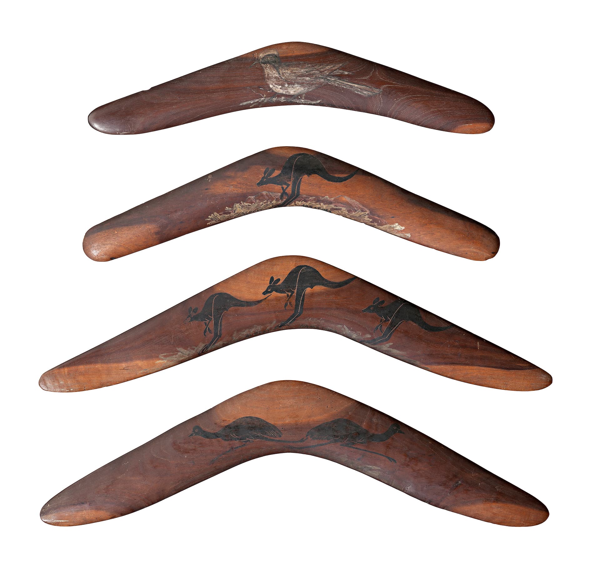 FOUR DECORATED BOOMERANGS