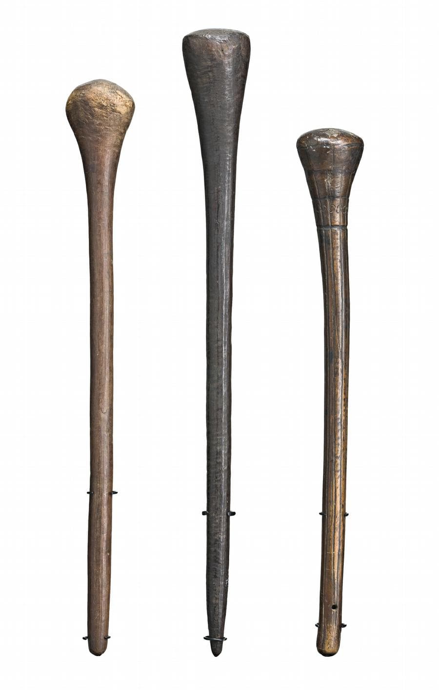 THREE THROWING CLUBS
