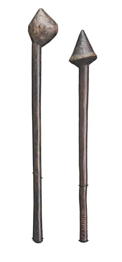 A PAIR OF BULBOUS HEADED THROWING CLUBS