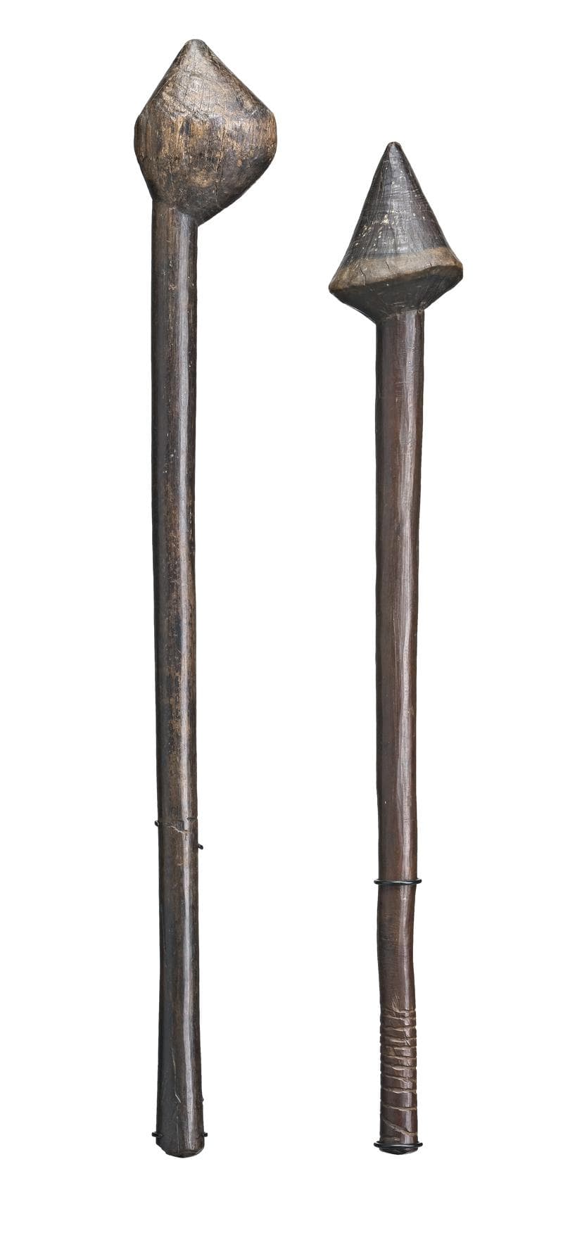 A PAIR OF BULBOUS HEADED THROWING CLUBS