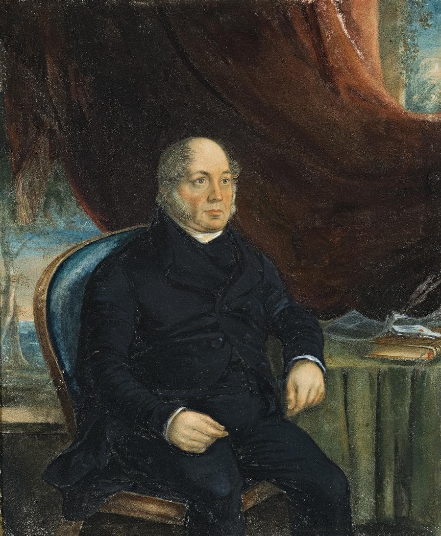 WILLIAM WATCHORN SEATED IN HIS STUDY
