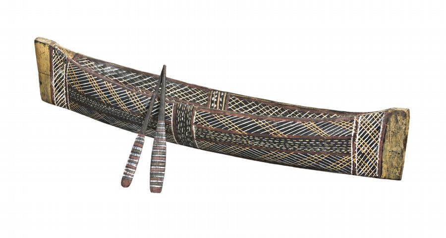 A MINIATURE CANOE AND PADDLES