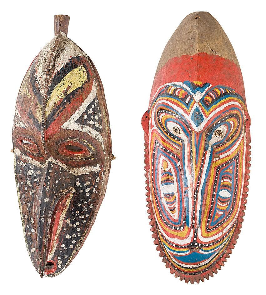 A PAIR OF COASTAL MASKS
