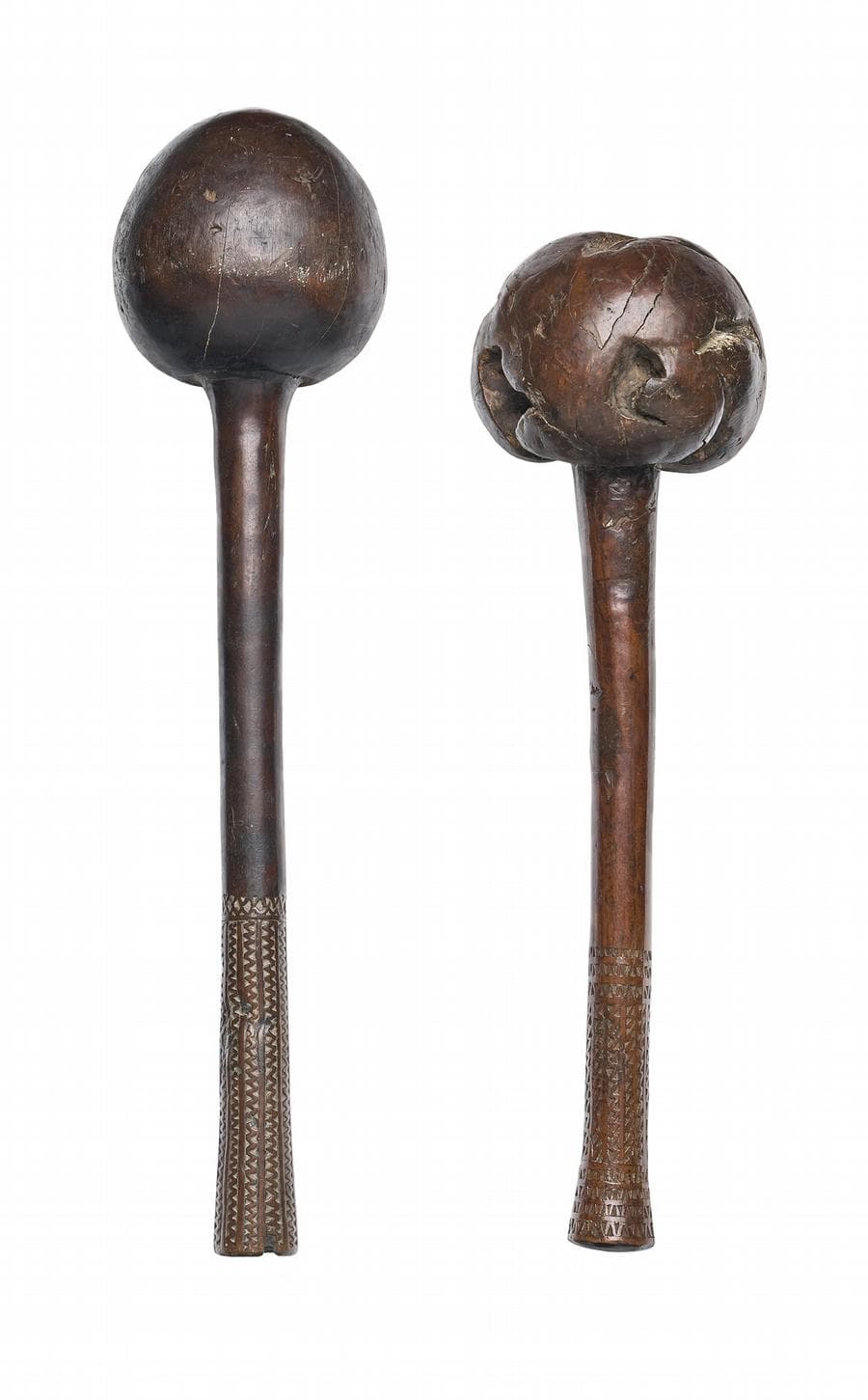 A PAIR OF THROWING CLUBS (ULA)