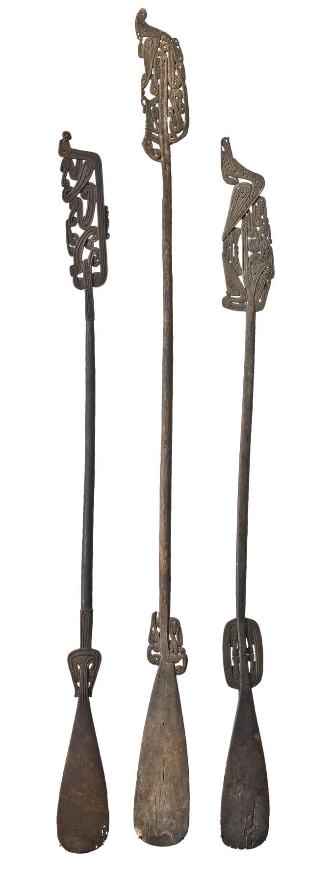 A GROUP OF THREE EARLY MASSIM PADDLES