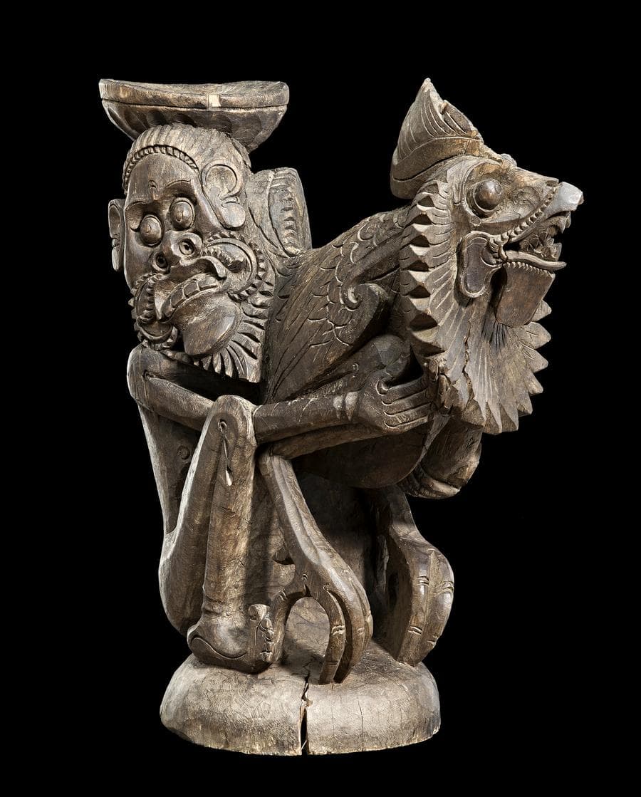 MAN HOLDING COCKEREL