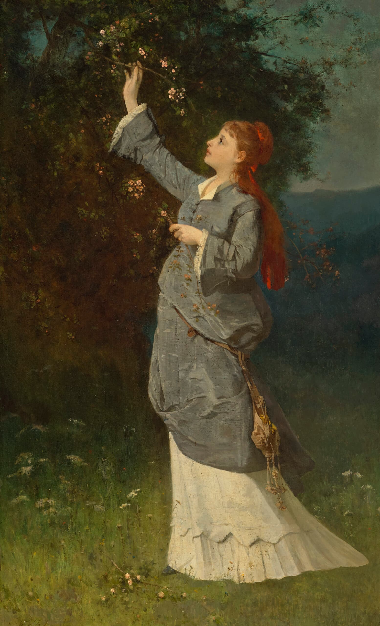 WOMAN PICKING BLOSSOM