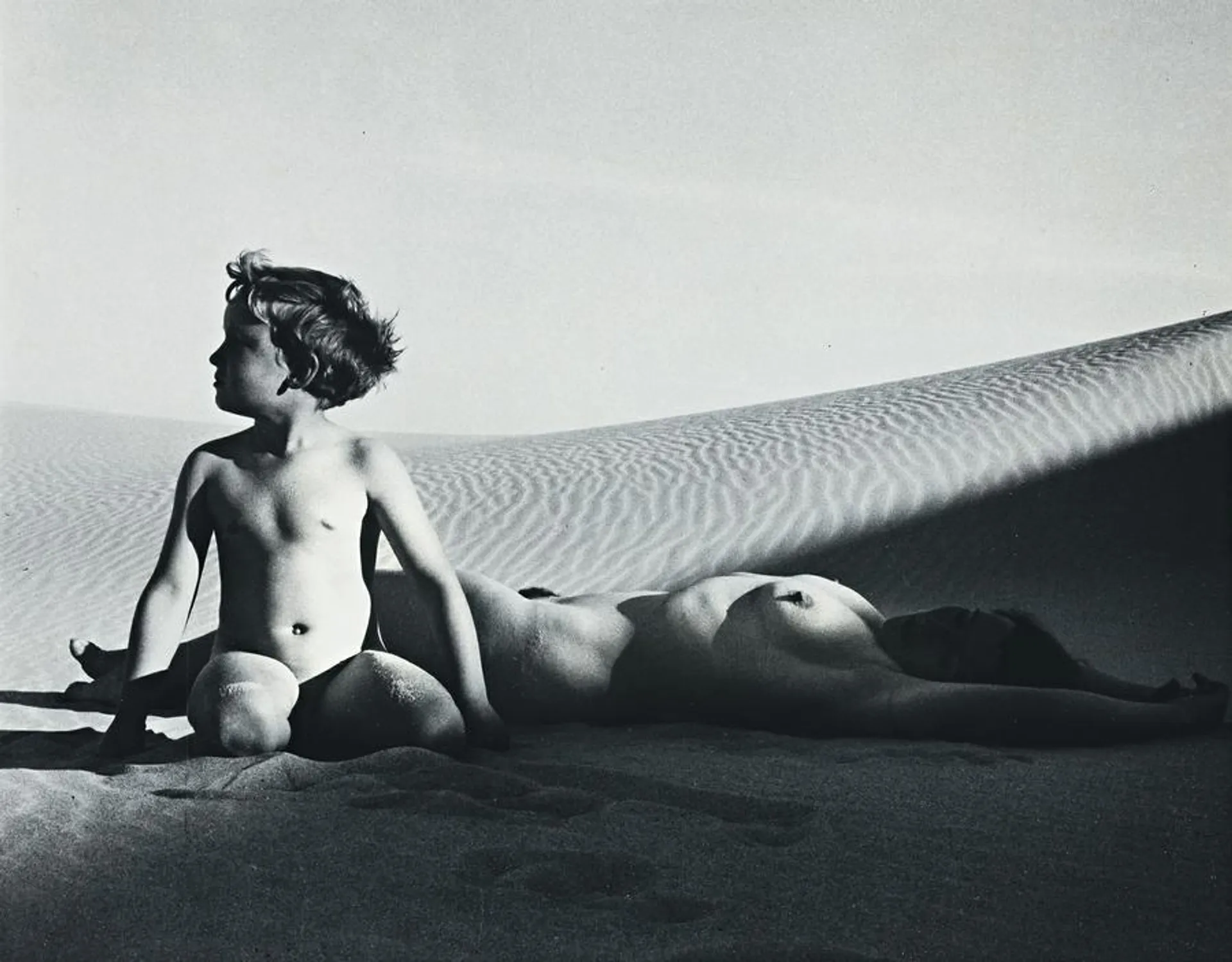 MOTHER AND CHILD IN DUNES