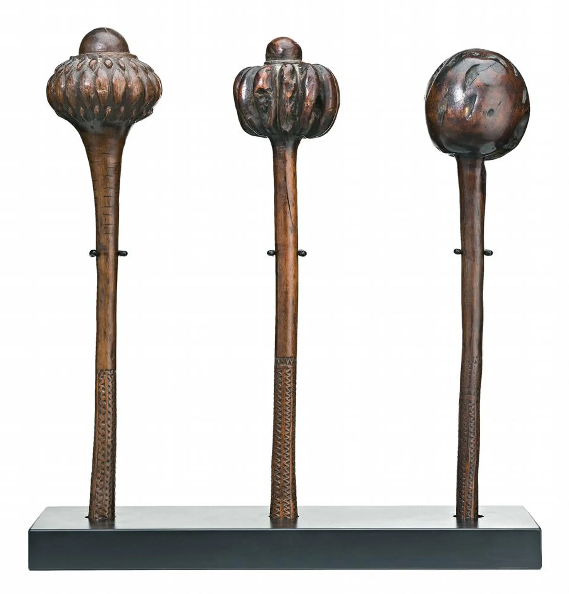 A GROUP OF THREE FIJIAN THROWING CLUBS (ULA)