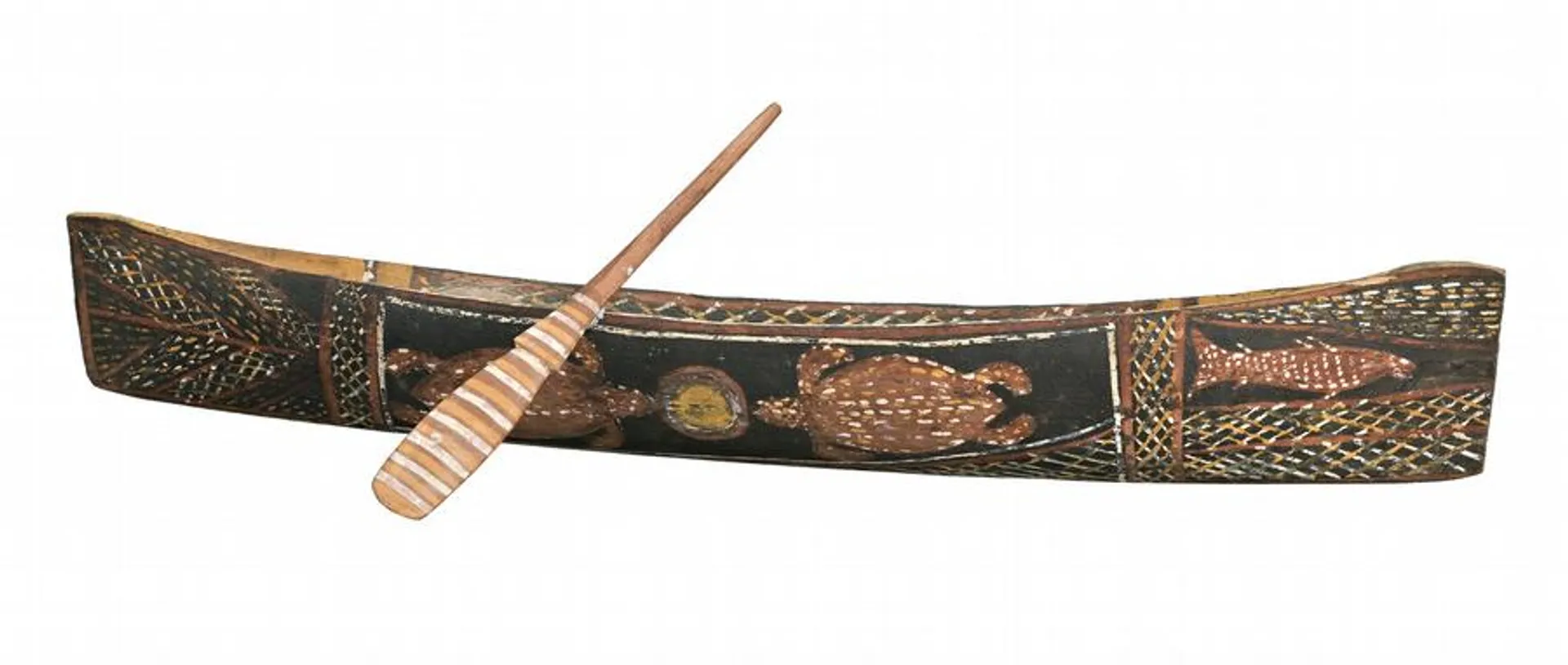 A MINIATURE CANOE AND PADDLE