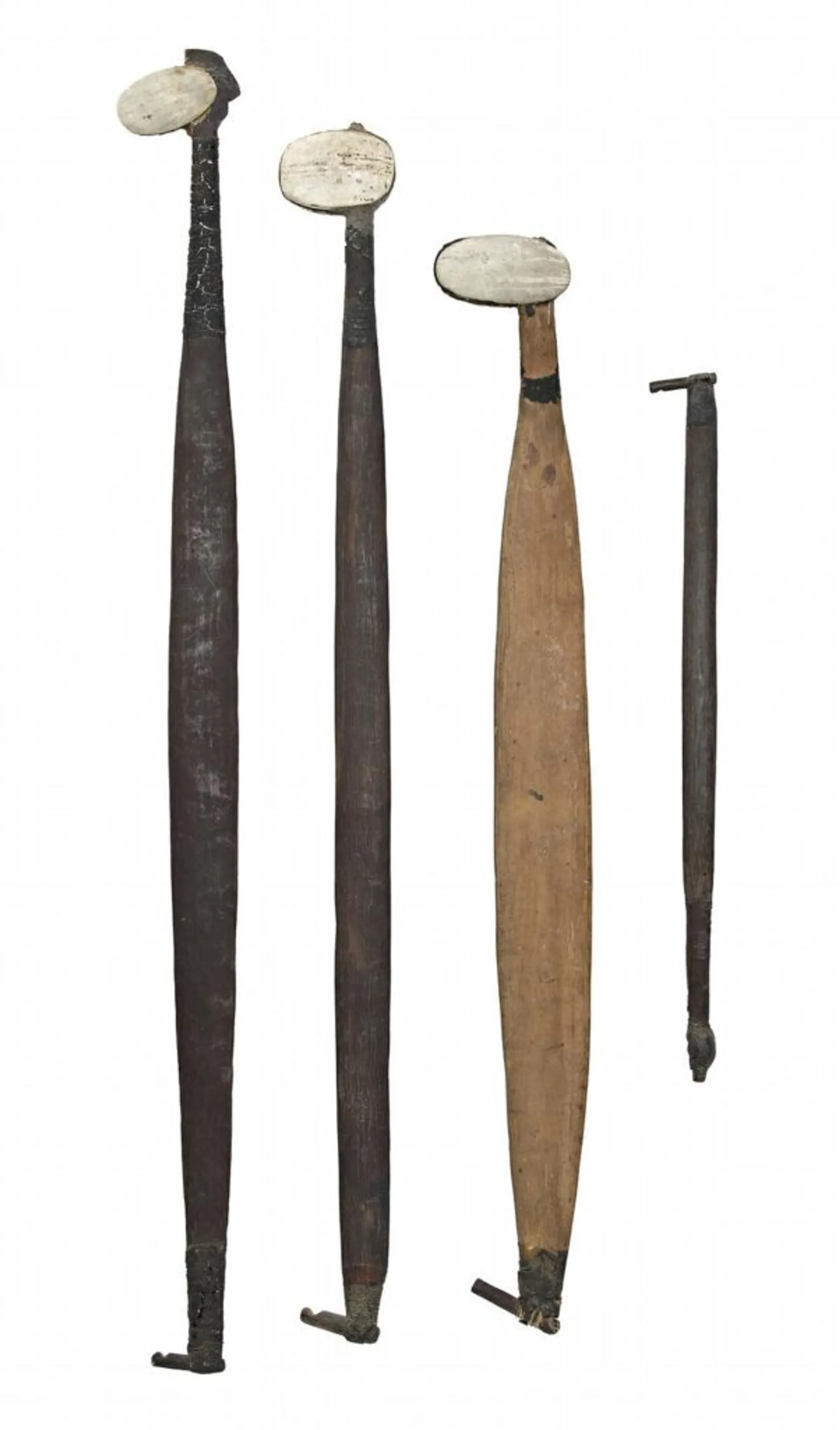 A GROUP OF FOUR SPEARTHROWERS