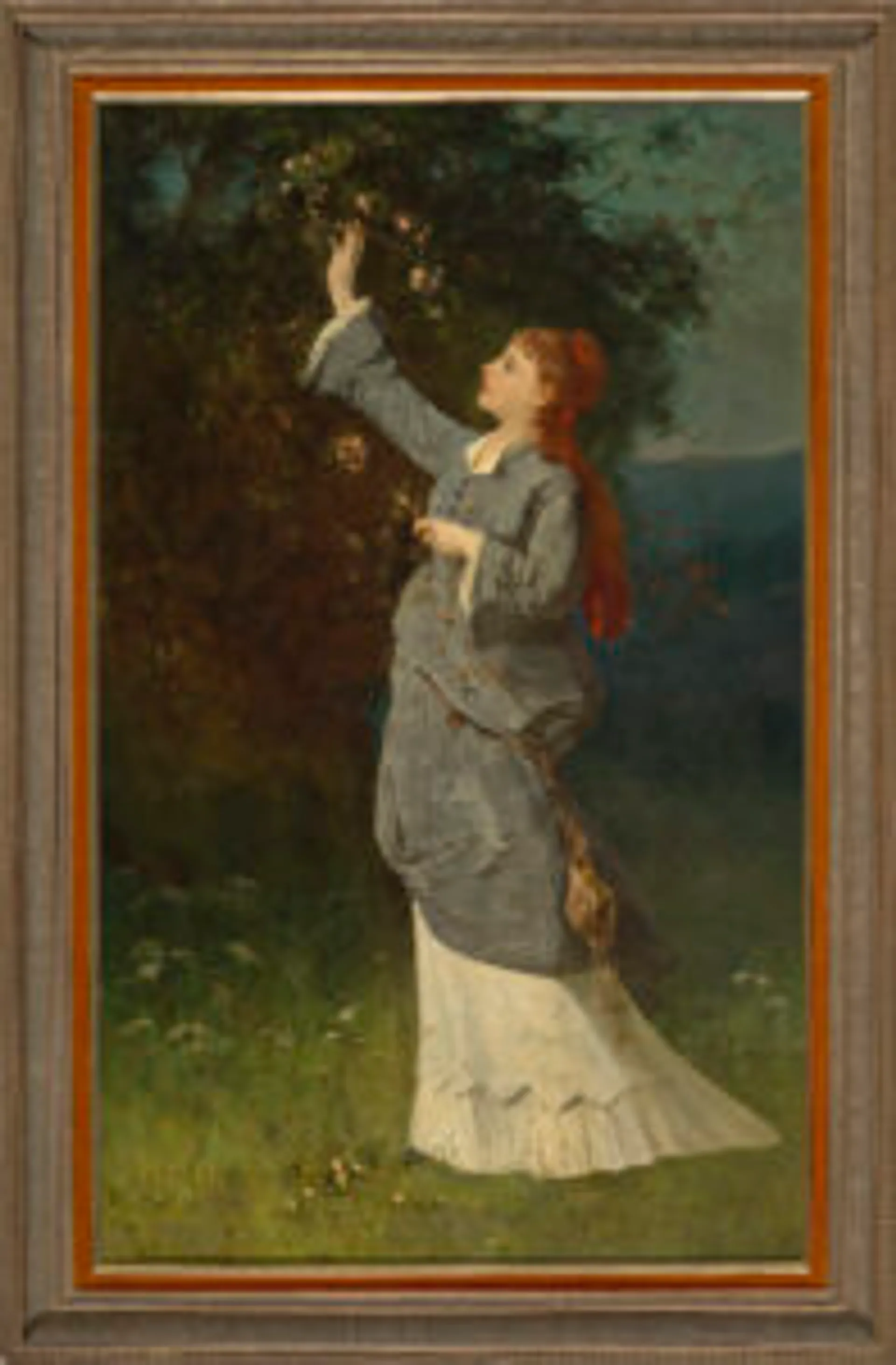 WOMAN PICKING BLOSSOM