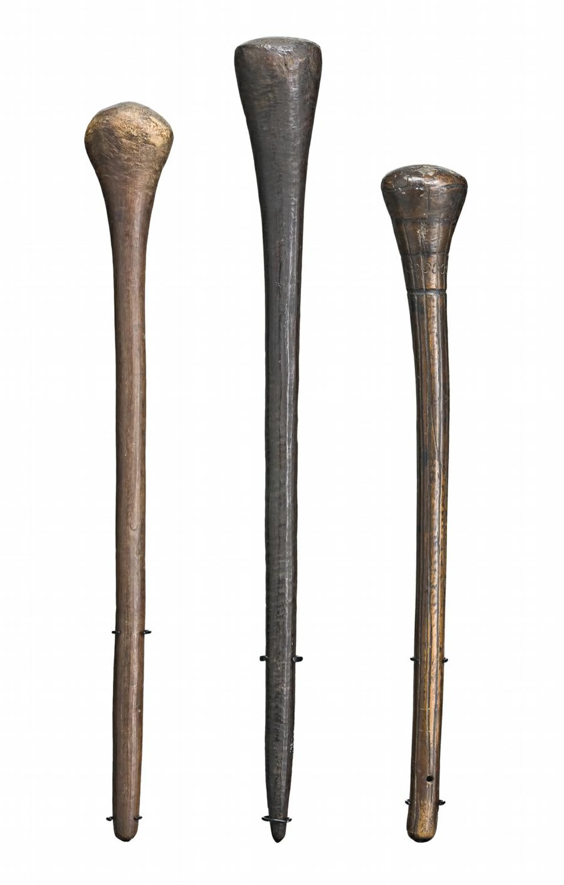 THREE THROWING CLUBS