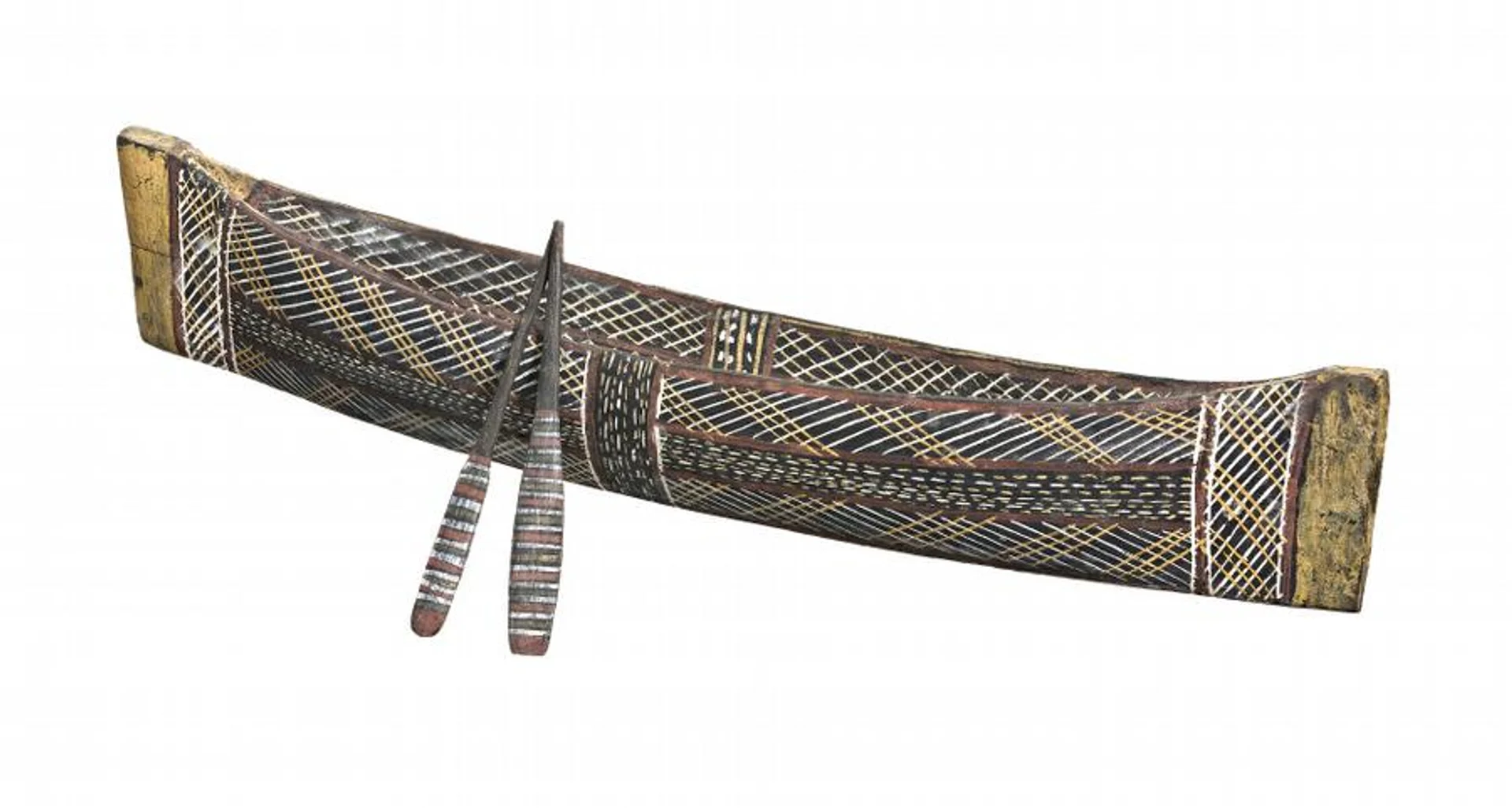 A MINIATURE CANOE AND PADDLES
