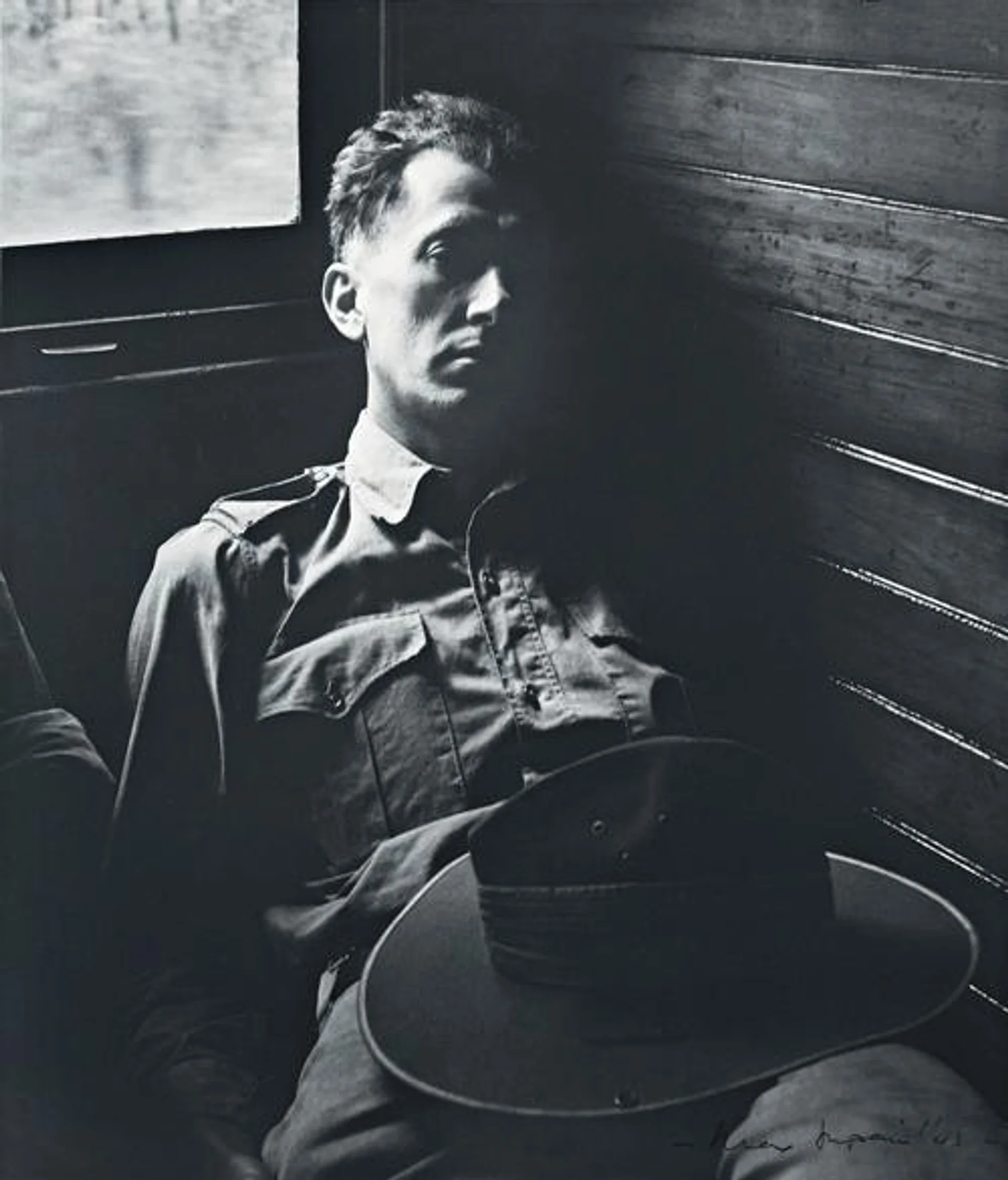 TIRED SOLDIER IN QUEENSLAND TRAIN