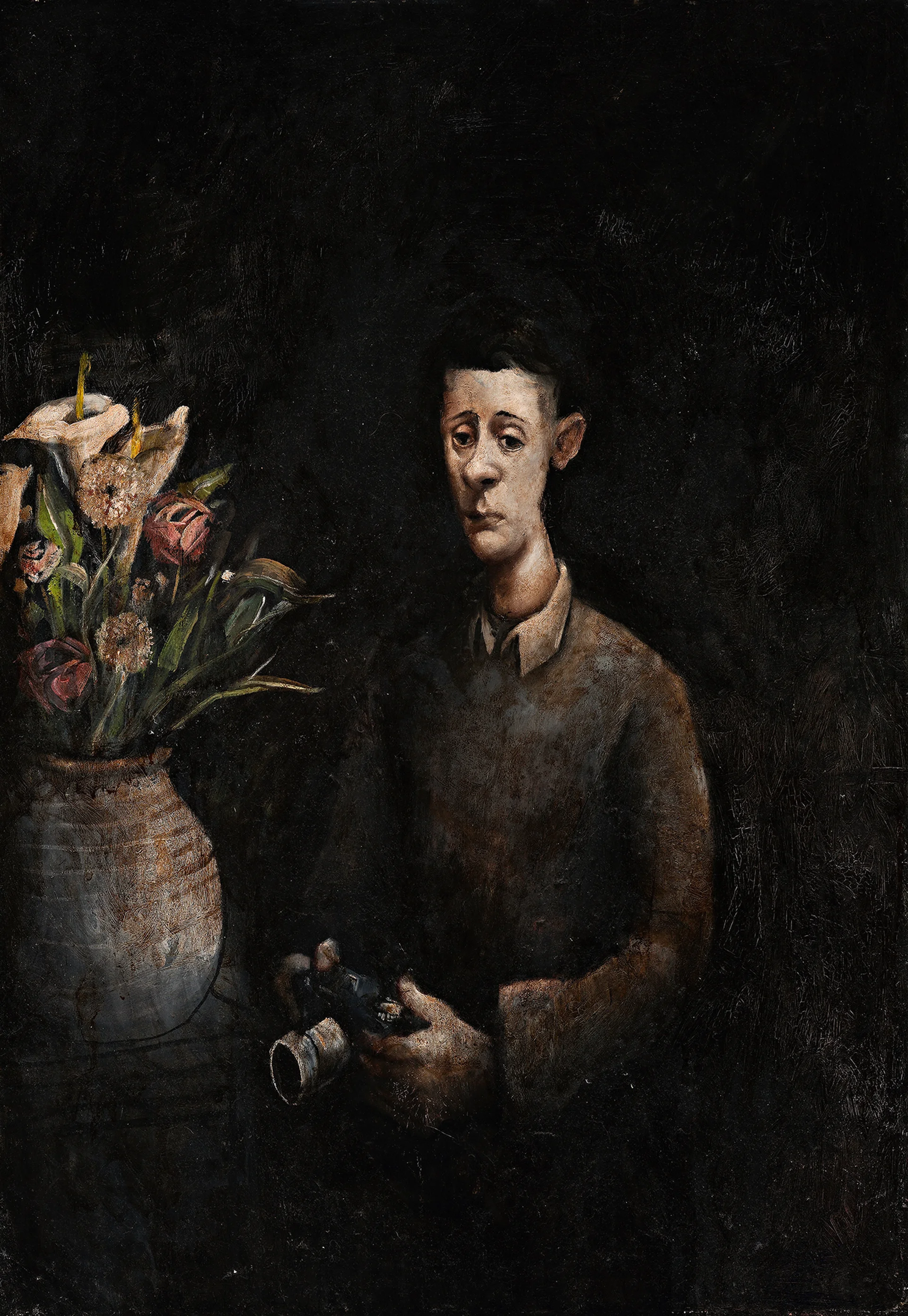MAN WITH CAMERA AND STILL LIFE