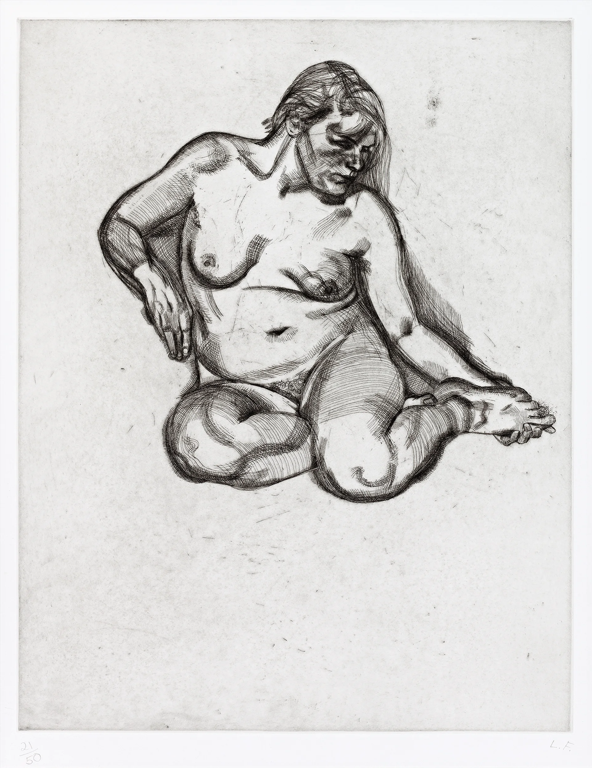 GIRL HOLDING HER FOOT